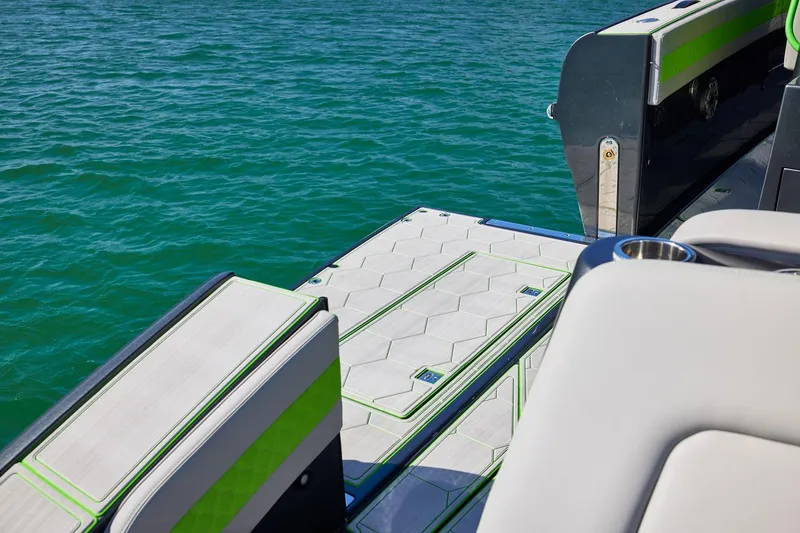 Slide: The Image of Luxury deck of Midnight Express 52' Vitesse yacht with sleek design and vibrant accents. - 15