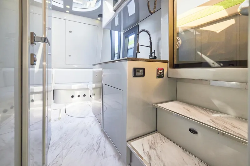 Slide: The Image of Luxurious interior of Midnight Express 52' Vitesse yacht with modern design and sleek finishes. - 20