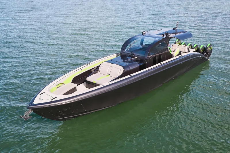 Slide: The Image of Luxury Midnight Express 52' Vitesse boat on calm water, featuring sleek design and powerful engines. - 4