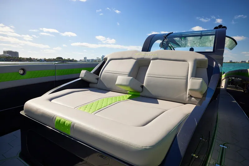 Slide: The Image of Luxurious seating on a Midnight Express 52' Vitesse yacht, featuring sleek design and vibrant accents. - 8