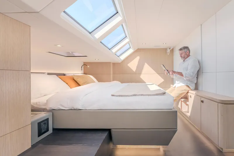 Slide: The Image of Luxurious interior of 2025 Privilege Signature 650 yacht with skylights and modern design. - 27