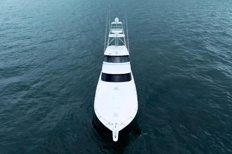 Slide: The Image of Aerial view of 2009 Viking 74 Enclosed Bridge yacht on open water. - 15