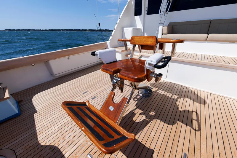 Slide: The Image of Luxury fishing chair on 2009 Viking 74 Enclosed Bridge yacht deck, ocean view. - 50