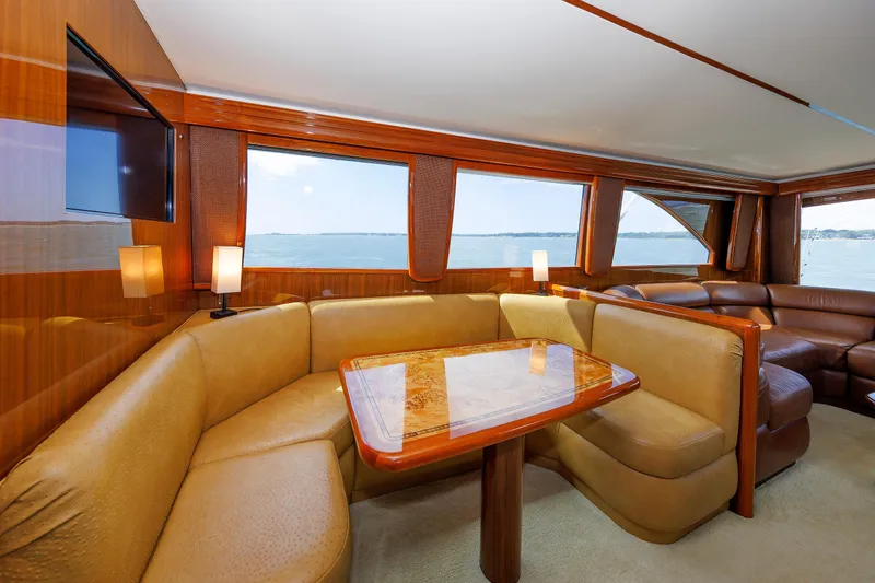 Slide: The Image of Luxurious interior of 2009 Viking 74 Enclosed Bridge yacht with elegant seating and ocean view. - 67