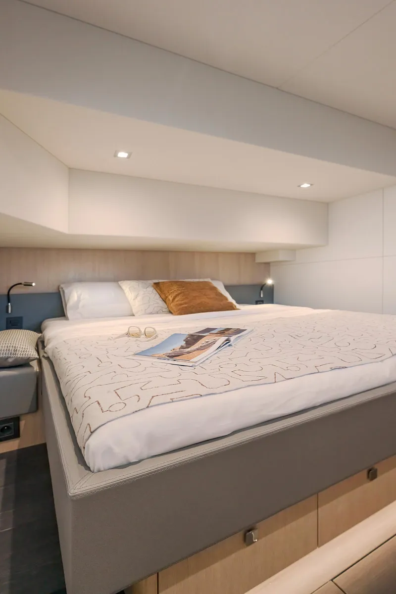 Slide: The Image of Luxurious bedroom in 2025 Privilege Signature 650 yacht, featuring modern design and cozy lighting. - 40