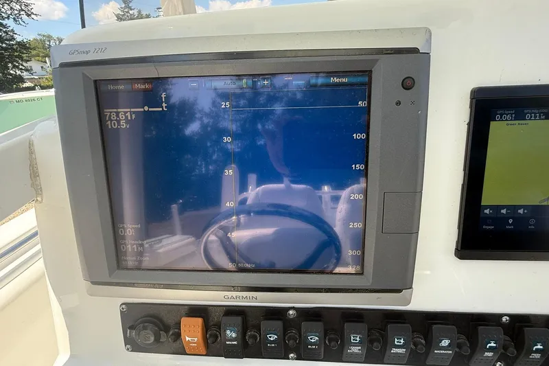 Slide: The Image of Garmin GPS display on 2015 Sea Hunt Gamefish 27 boat dashboard. - 25