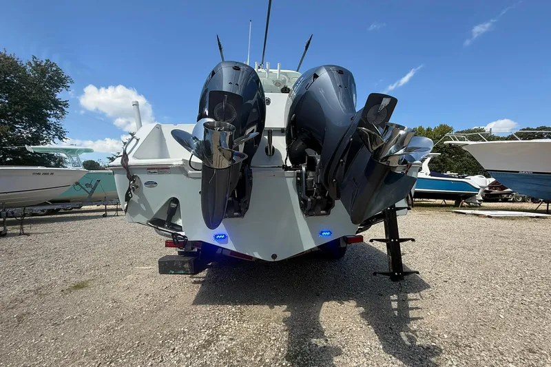 Slide: The Image of 2015 Sea Hunt Gamefish 27 with dual outboard motors on display. - 9