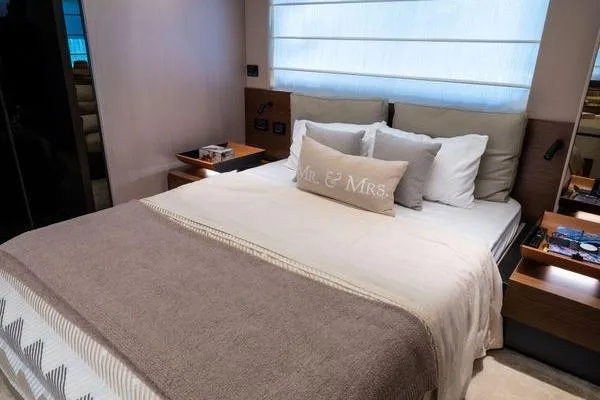 Slide: The Image of Luxurious bedroom interior of 2024 Azimut S7 yacht with elegant bedding and decor. - 11