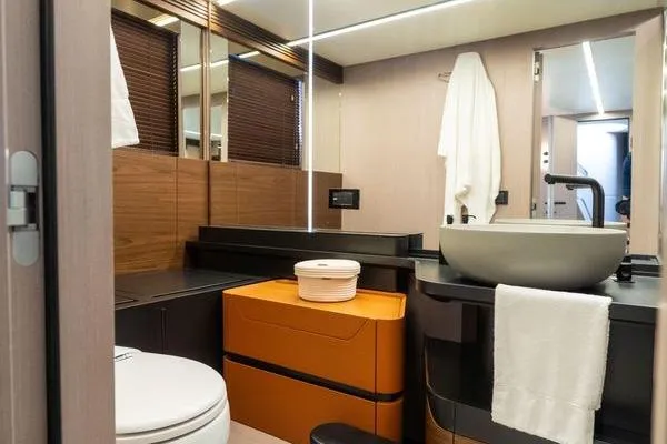Slide: The Image of Luxurious bathroom interior of 2024 Azimut S7 yacht with modern fixtures and elegant design. - 12