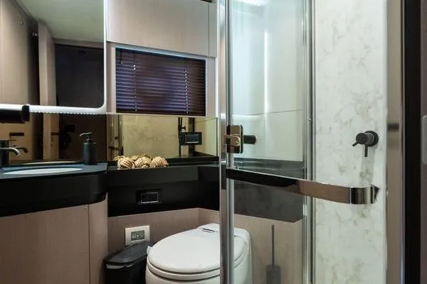 Slide: The Image of Luxurious bathroom interior of 2024 Azimut S7 yacht with modern fixtures and elegant design. - 15