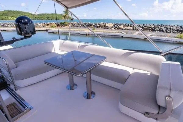 Slide: The Image of Luxurious 2024 Azimut S7 yacht deck with elegant seating and ocean view. - 23