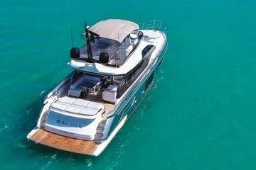 Slide: The Image of 2024 Azimut S7 yacht cruising on turquoise waters, showcasing luxury and elegance. - 4