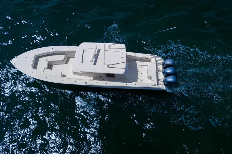 Slide: The Image of Aerial view of 2018 Jupiter 38 FS boat cruising on open water. - 12