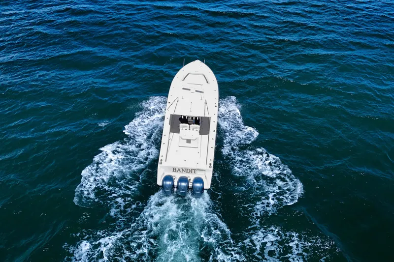 Slide: The Image of Aerial view of 2018 Jupiter 38 FS boat cruising on open water. - 14
