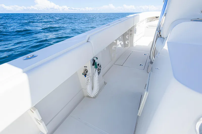Slide: The Image of 2018 Jupiter 38 FS boat deck with ocean view, showcasing sleek design and spacious layout. - 28