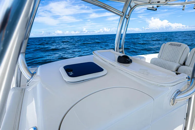 Slide: The Image of 2018 Jupiter 38 FS boat interior with ocean view, featuring sleek design and comfortable seating. - 39