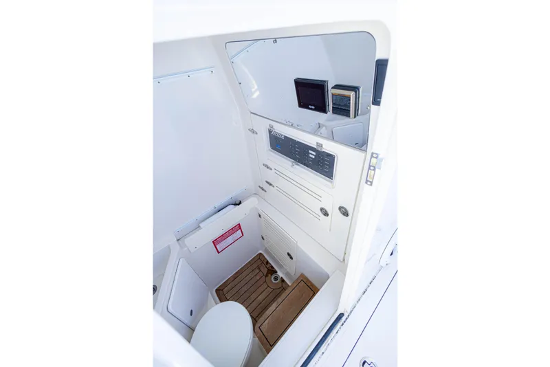 Slide: The Image of 2018 Jupiter 38 FS boat interior with control panel and wooden flooring. - 41