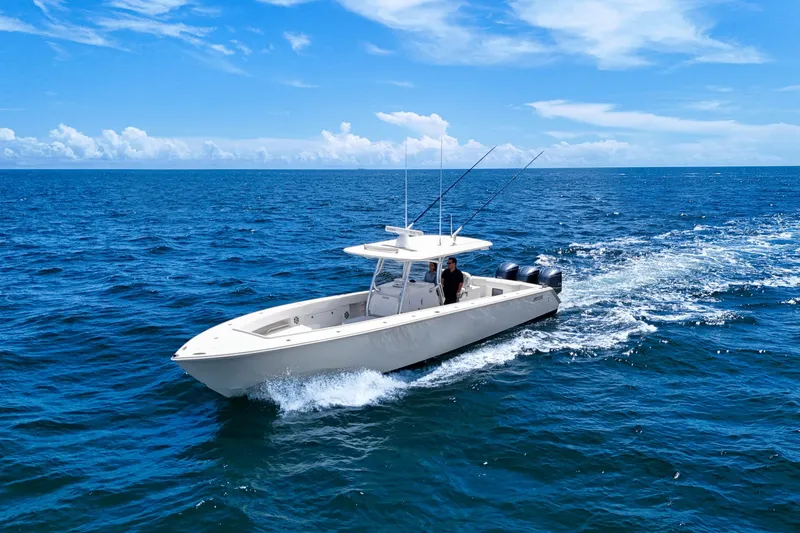 Slide: The Image of 2018 Jupiter 38 FS boat cruising on open ocean under clear blue sky. - 5
