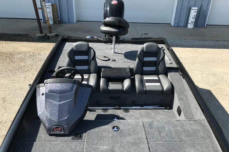 Slide: The Image of 2026 Ranger RT188P boat interior with carpeted deck and seating. - 10