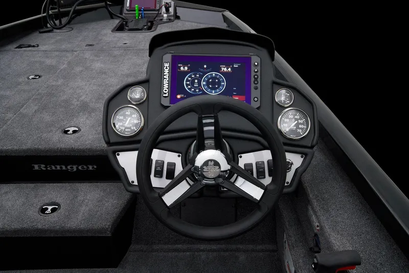 Slide: The Image of Manufacturer Provided Image: 2025 Ranger RT188P boat interior with steering wheel, dashboard, and seating. - 41