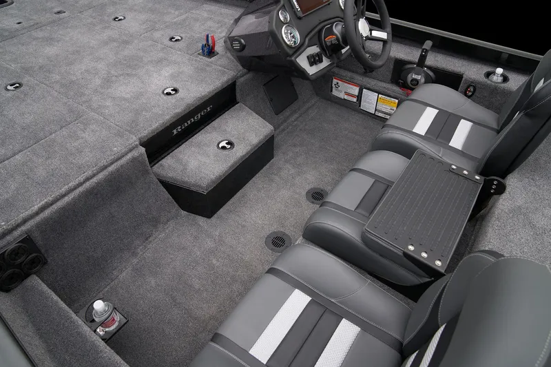 Slide: The Image of Manufacturer Provided Image: 2025 Ranger RT188P boat interior with rod storage and seating. - 56