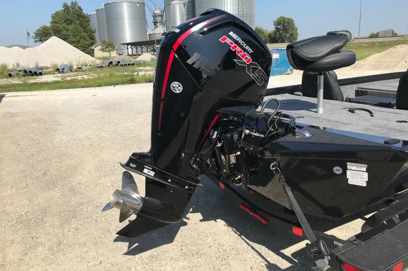 Slide: The Image of 2026 Ranger RT188P boat with Mercury Pro XS outboard motor in a sunny outdoor setting. - 6