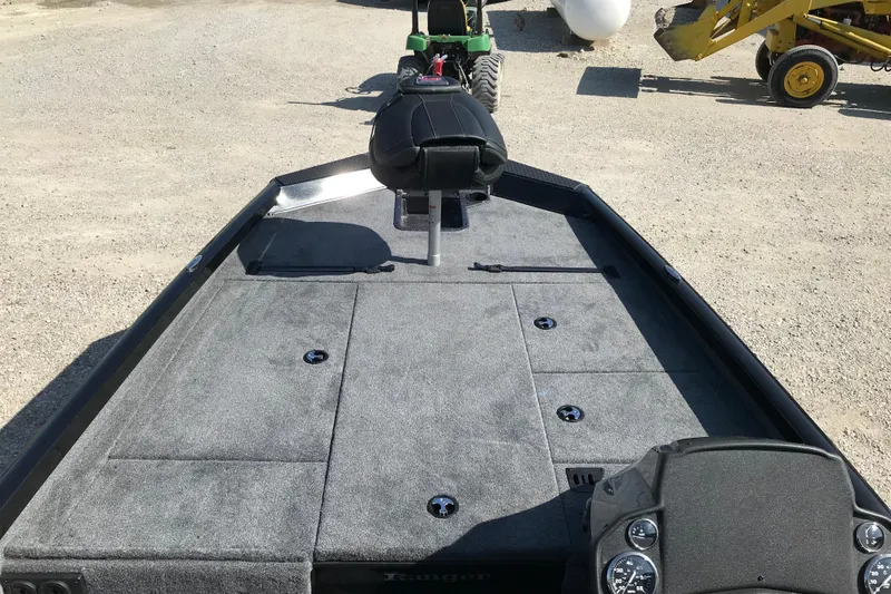 Slide: The Image of 2026 Ranger RT188P boat with Mercury Pro XS outboard motor in an industrial setting. - 8