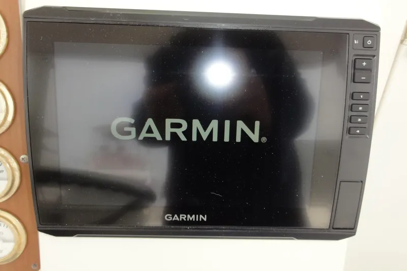 Slide: The Image of Garmin display on 2002 Rampage 30 Open boat dashboard. - 16