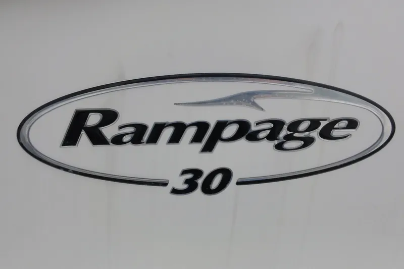 Slide: The Image of Rampage 30 Open 2002 logo on white background, oval design. - 7