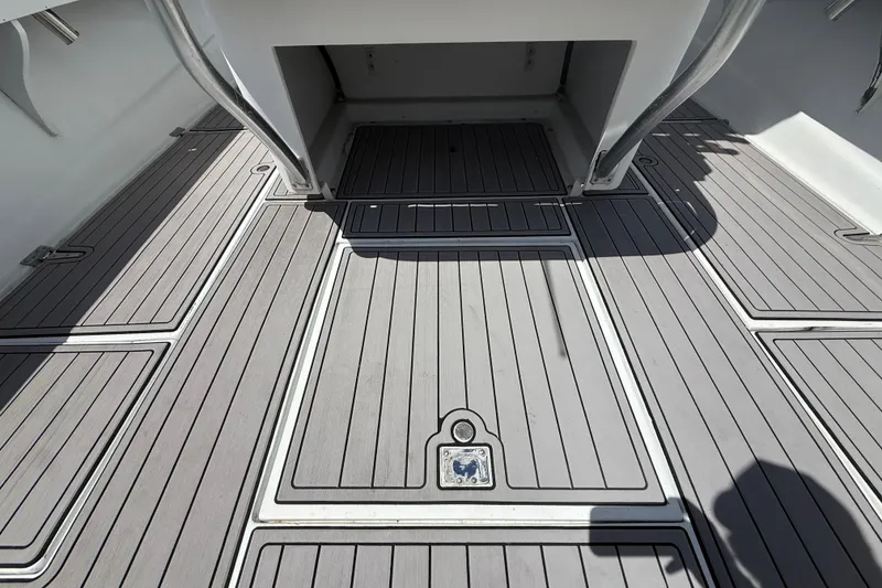 Slide: The Image of 1981 T Craft Gulfstream 30 boat deck with sleek, modern design and durable flooring. - 10