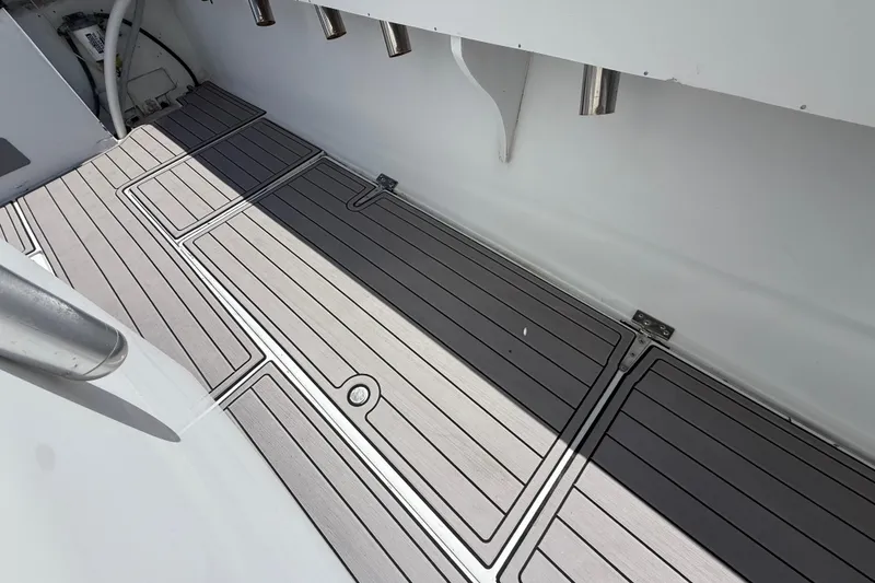 Slide: The Image of 1981 T Craft Gulfstream 30 boat deck with sleek, modern design and durable flooring. - 15