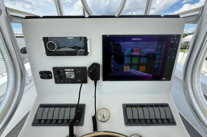 Slide: The Image of Control panel of a 1981 T Craft Gulfstream 30 boat with Simrad electronics. - 29