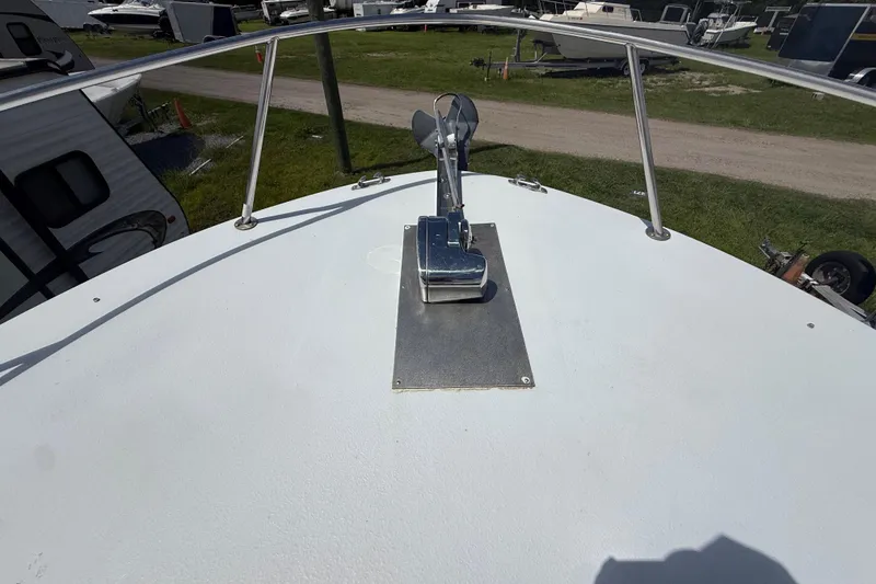 Slide: The Image of Bow of 1981 T Craft Gulfstream 30 with anchor and railing. - 50