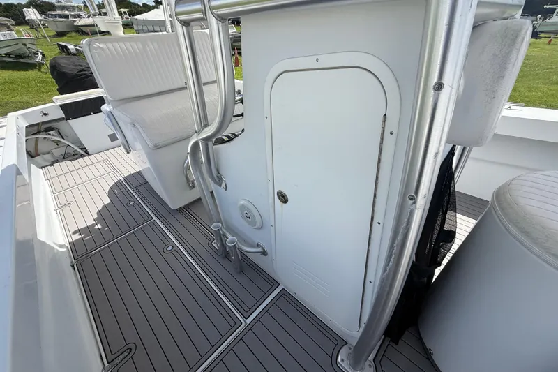 Slide: The Image of 1981 T Craft Gulfstream 30 boat interior with seating and storage compartment. - 61