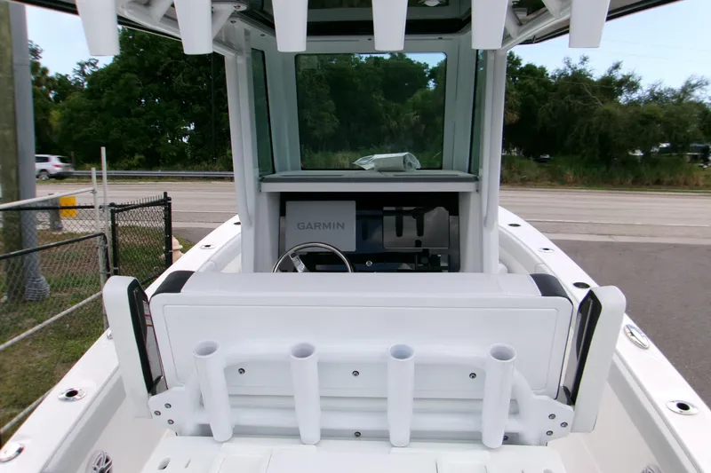 Slide: The Image of 2026 Blackfin 262 HB boat helm with Garmin navigation system and rod holders. - 4