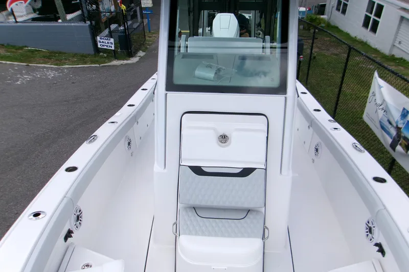 Slide: The Image of 2026 Blackfin 262 HB boat interior with sleek white design and modern features. - 9