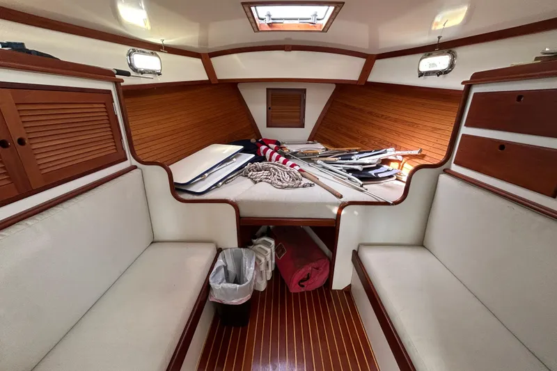 Slide: The Image of Cozy cabin interior of 1994 John Williams Stanley 36 sailboat with wooden accents. - 8