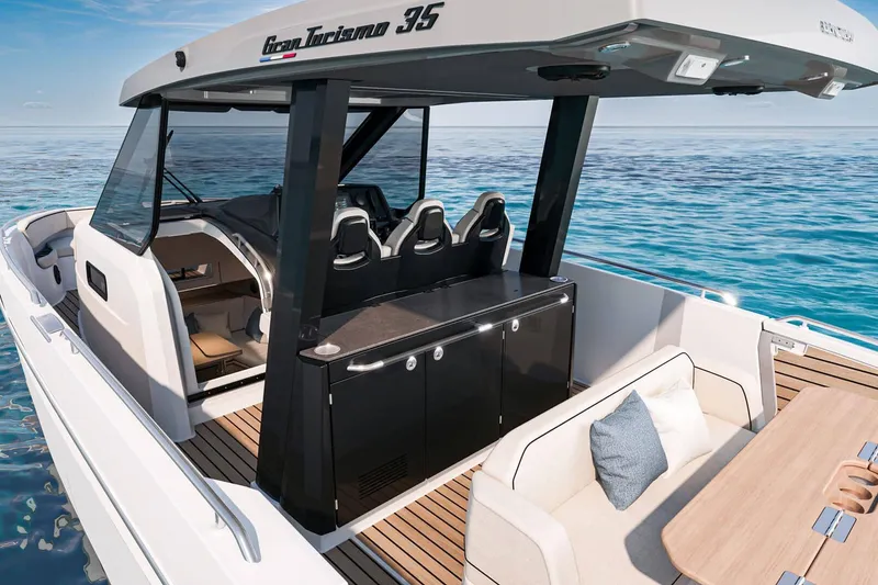 Slide: The Image of 2026 Beneteau Grand Turismo 35 yacht on clear blue water, showcasing sleek design. - 6