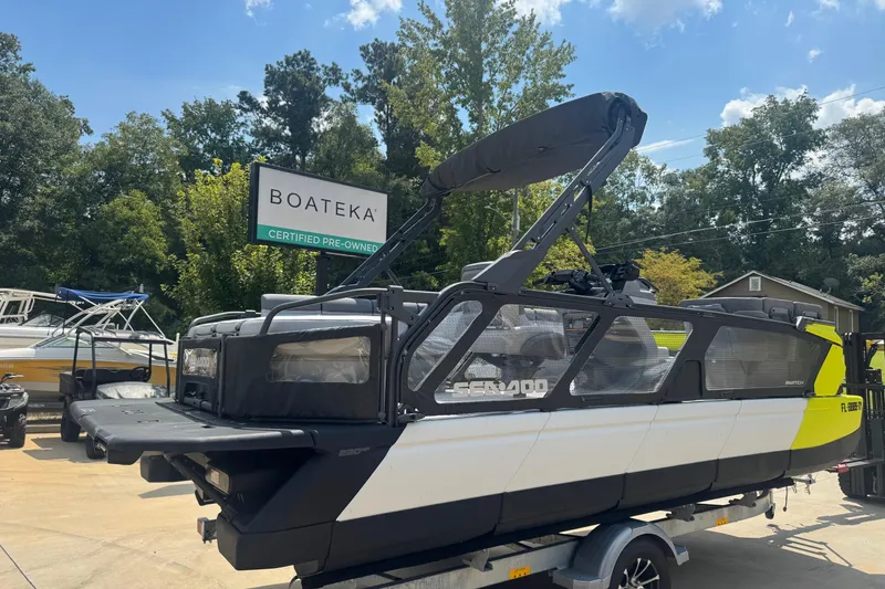Slide: The Image of 2024 Sea-Doo Switch Cruise 21 pontoon boat at Boateka, certified pre-owned. - 2
