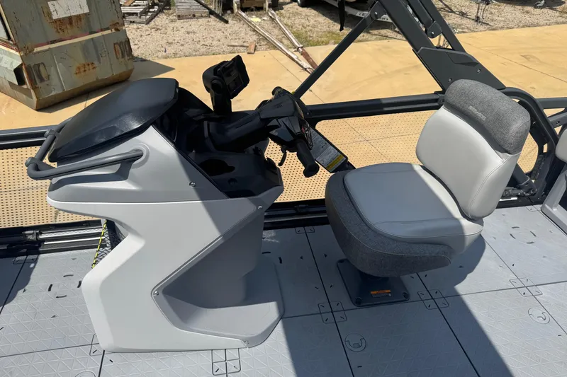 Slide: The Image of 2024 Sea-Doo Switch Cruise 21 helm with modern controls and comfortable seating. - 4