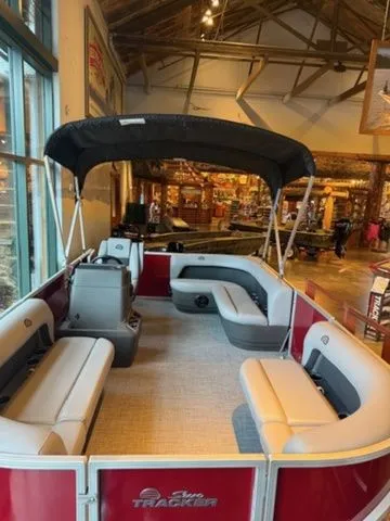 Slide: The Image of 2026 Sun Tracker PB 16 pontoon boat in showroom. - 8