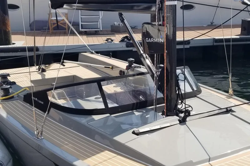 Slide: The Image of 2025 Saffier Se 27 Leisure sailboat docked, featuring sleek design and Garmin equipment. - 3
