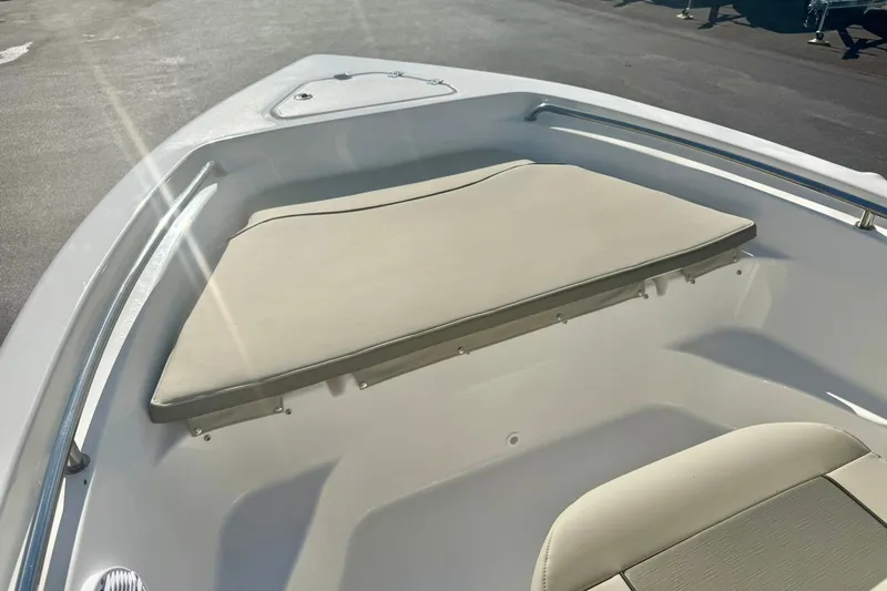 Slide: The Image of 2026 Key West 189 FS boat interior with cushioned seating and sleek design. - 10