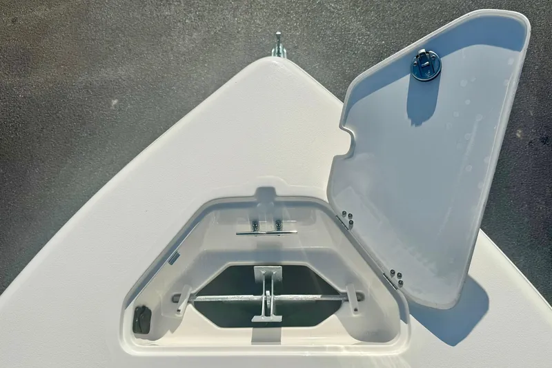 Slide: The Image of Open anchor compartment on 2026 Key West 189 FS boat, showcasing storage design. - 14