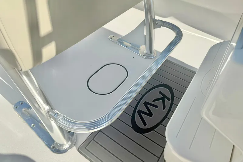 Slide: The Image of 2026 Key West 189 FS boat interior with KW logo on floor mat. - 19