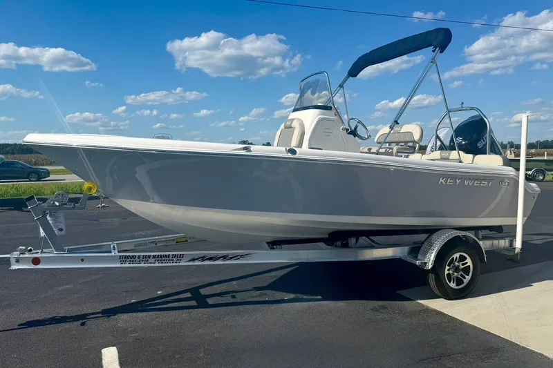 Slide: The Image of 2026 Key West 189 FS boat on trailer under clear blue sky. - 5