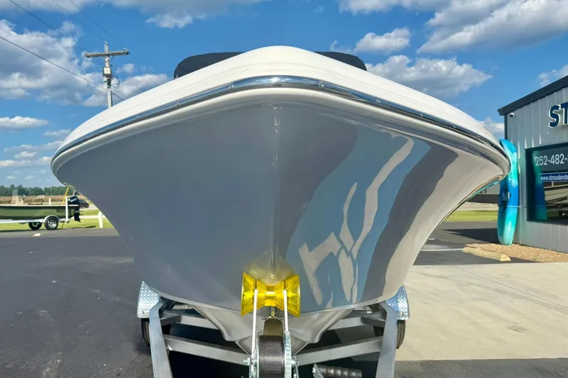 Slide: The Image of 2026 Key West 189 FS boat on trailer, under clear blue sky. - 8