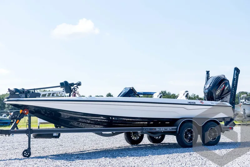 The Image of 2026 Skeeter ZXE21 boat on trailer, sleek design, outdoor setting. - 1