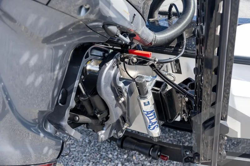 Slide: The Image of Close-up of 2026 Skeeter ZXE21 boat engine components and hydraulic system. - 22