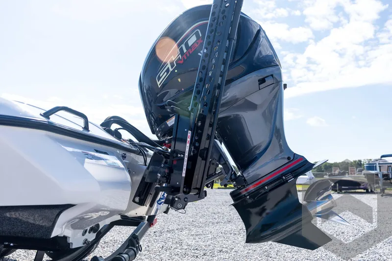 Slide: The Image of 2026 Skeeter ZXE21 boat engine, close-up view, outdoors on a sunny day. - 27